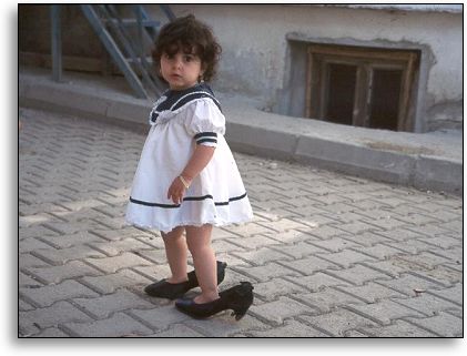 Little Girl in Big Shoes